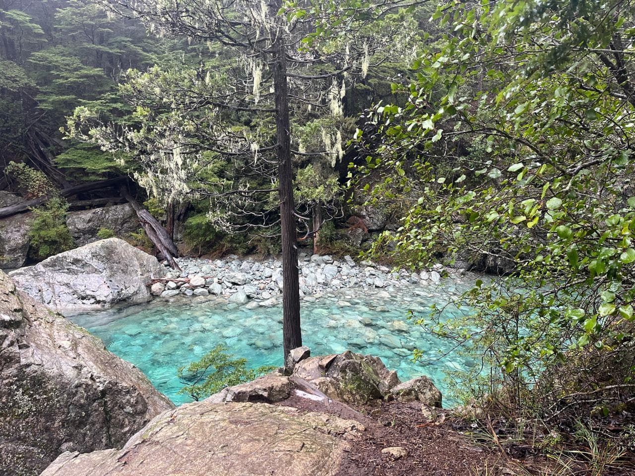 The magnetic waters of the Azul River. Its turquoise color is due to glacial sediment, and it is the inseparable companion of almost every hike in El Bolsón.