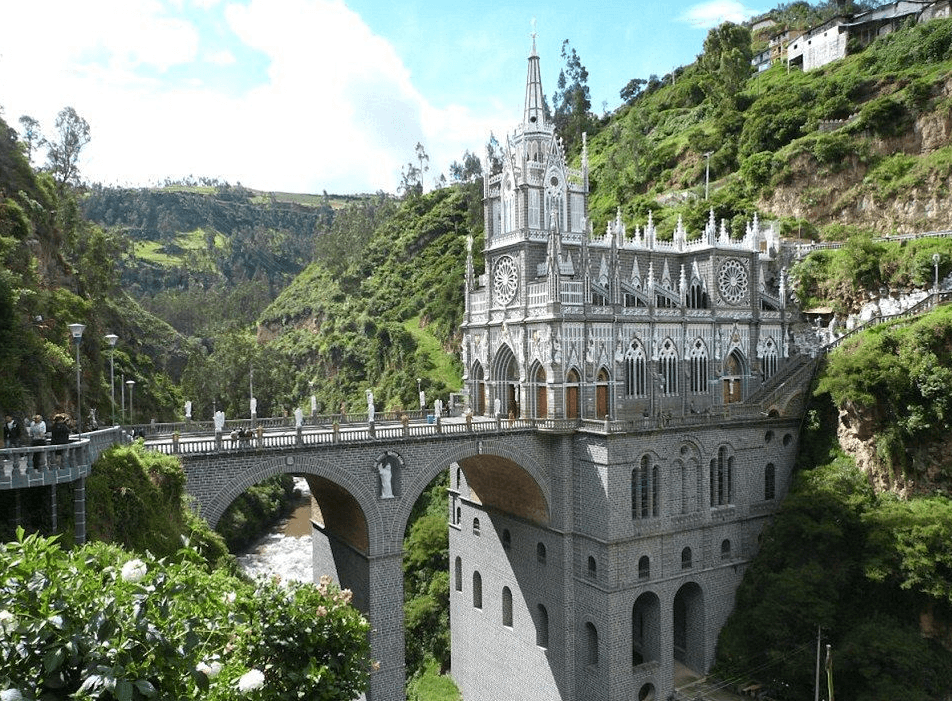 The Sanctuary of Our Lady of Las Lajas is a spectacular neo-Gothic basilica considered one of the most beautiful churches in the world. It is built directly on a 50-meter-high stone bridge that crosses the imposing canyon of the Guáitara River in the municipality of Ipiales, Colombia.