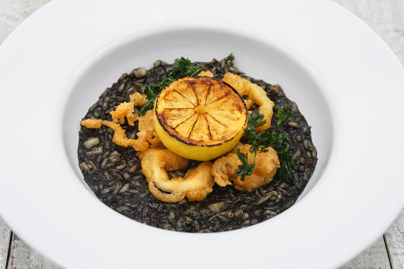 Crni rižot. Rice with squid ink typical of the Dalmatian coast.