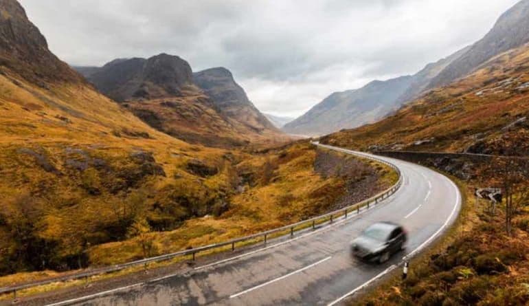 The breathtaking panoramic view of the Glencoe mountains under a moody grey sky typical of the Highlands.