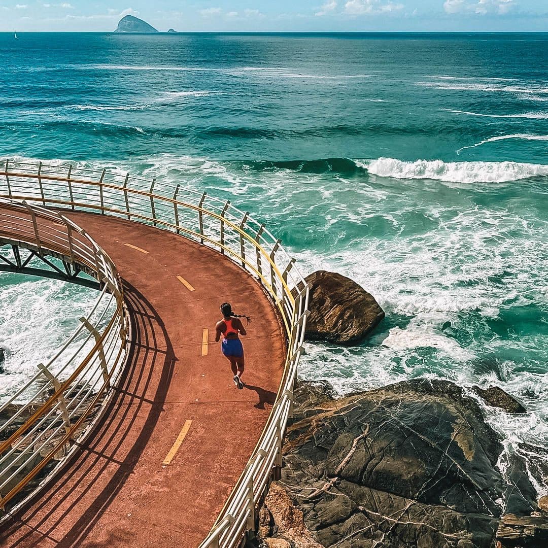 Bike path suspended over the sea on the way to Barra da Tijuca, Rio de Janeiro, Brazil.