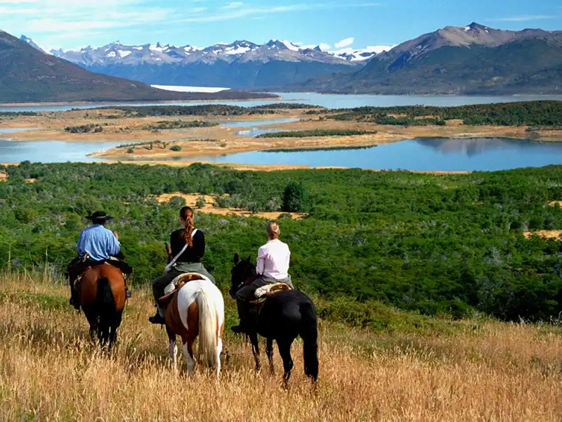 Horseback riding through the steppe in El Calafate, Argentina.