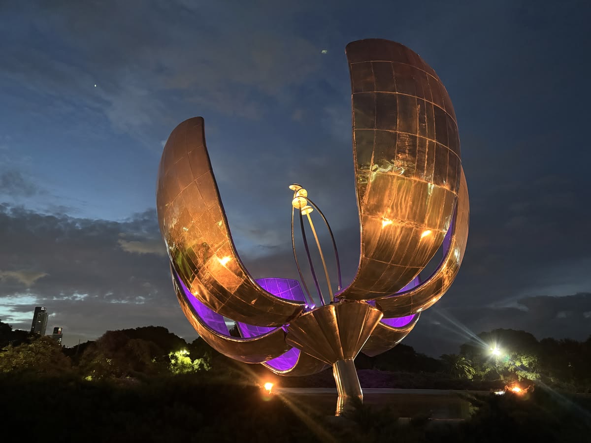 View of the Floralis Genérica illuminated at night in Recoleta, Buenos Aires.