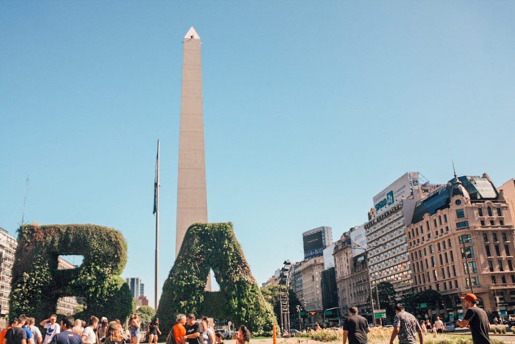 The Obelisco of Buenos Aires seen behind the iconic green BA vertical garden sign.