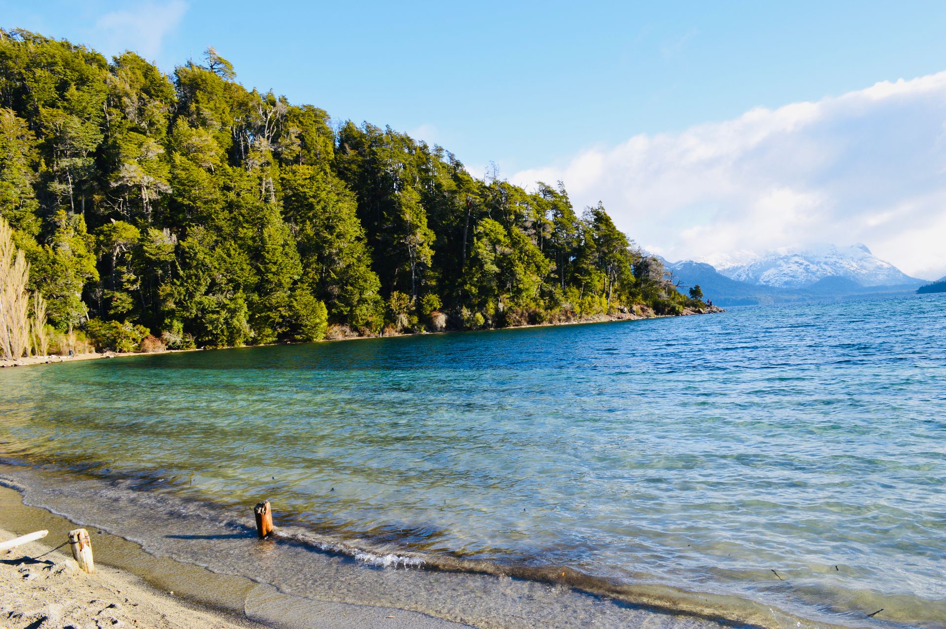 Transparent turquoise and emerald waters at Yuco Beach, Lanín National Park, San Martín de los Andes.