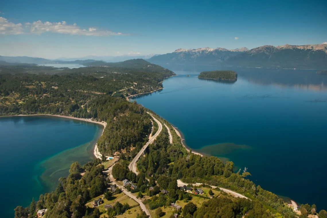 A stretch of the scenic Seven Lakes Route surrounded by dense Andean-Patagonian forests.