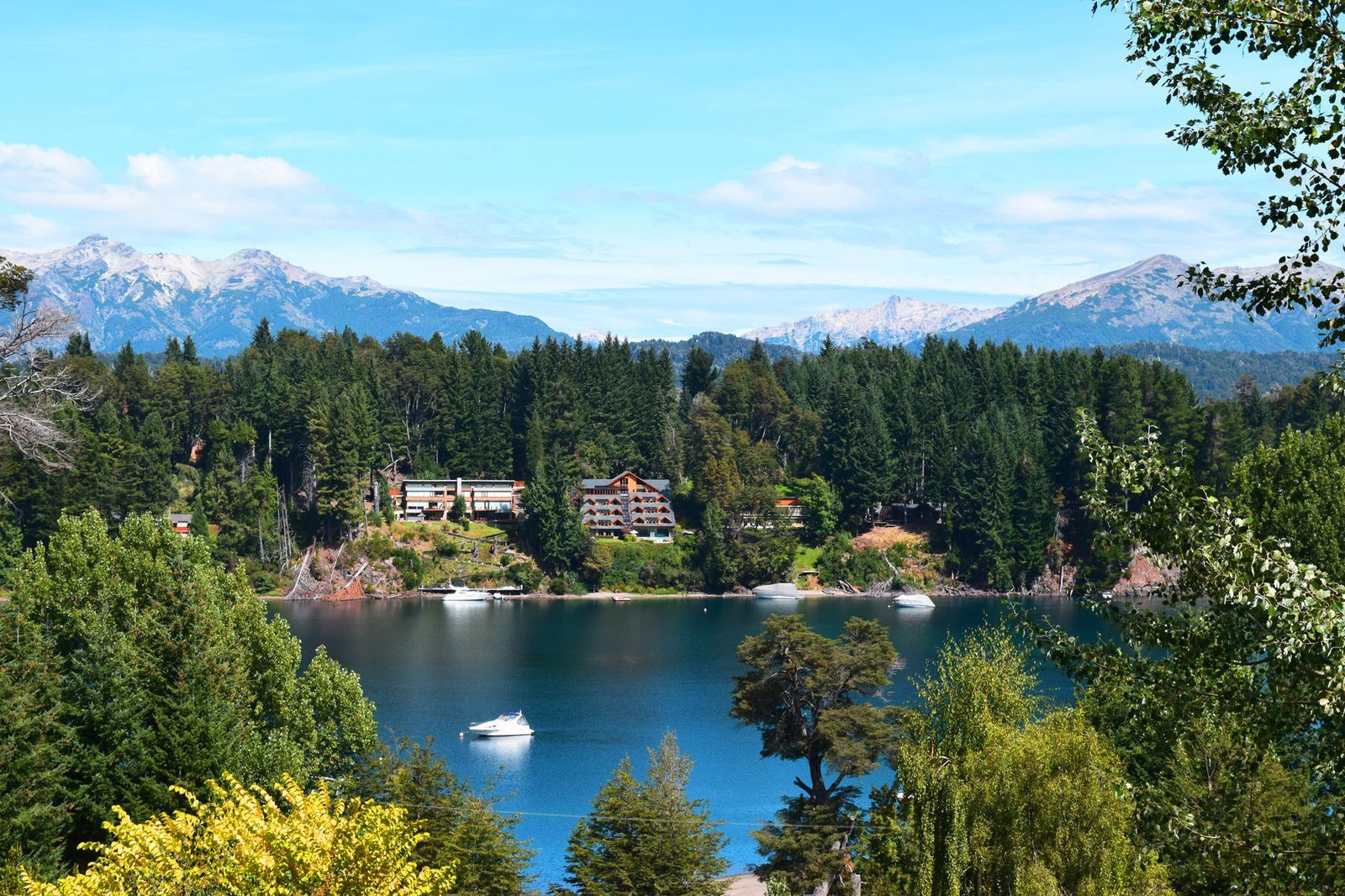 Bahía Manzano featuring its quiet beaches and signature Patagonian residential architecture, Villa La Angostura.